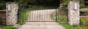 Omaha fence company residential fencing contractors Nebraska automated electric gate opener operators solar motor motorized automatic access control driveway estate slide swing rolling cantilever vertical lift vertical pivot open close stop key pad switch push button three button control intercom call button telephone entry computerized entry loop exit obstruction shadow detector transmitter receiver radio frequency wifi box cantilever aluminum