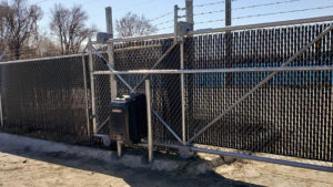 Omaha fence company commercial fencing contractors Nebraska gate installation commercial access control automated electric gate opener operators solar motor motorized automatic access control driveway estate slide swing rolling cantilever vertical lift vertical pivot open close stop key pad switch push button three button control intercom call button telephone entry computerized entry loop exit obstruction shadow detector transmitter receiver radio frequency wifi box cantilever aluminum